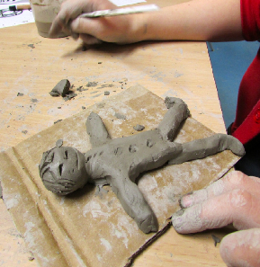Doing plasticine in the kindergarten with children